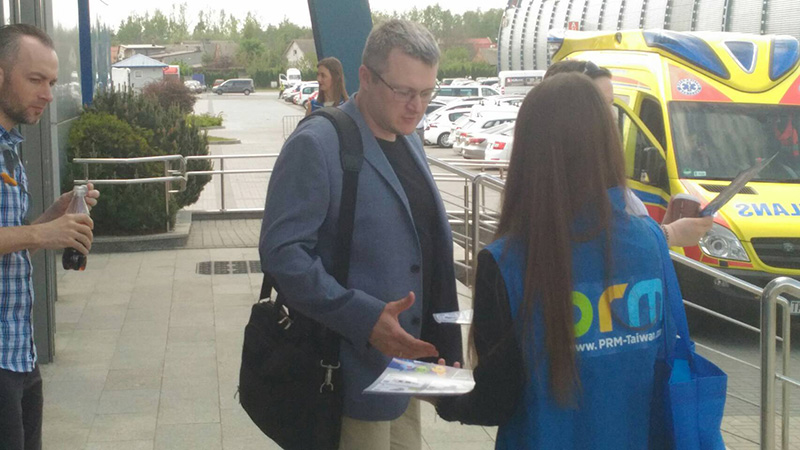 Handing out flyers